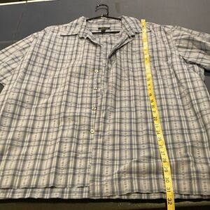 Van Heusen button-down, short sleeve collared shirt, blues in color.XL.